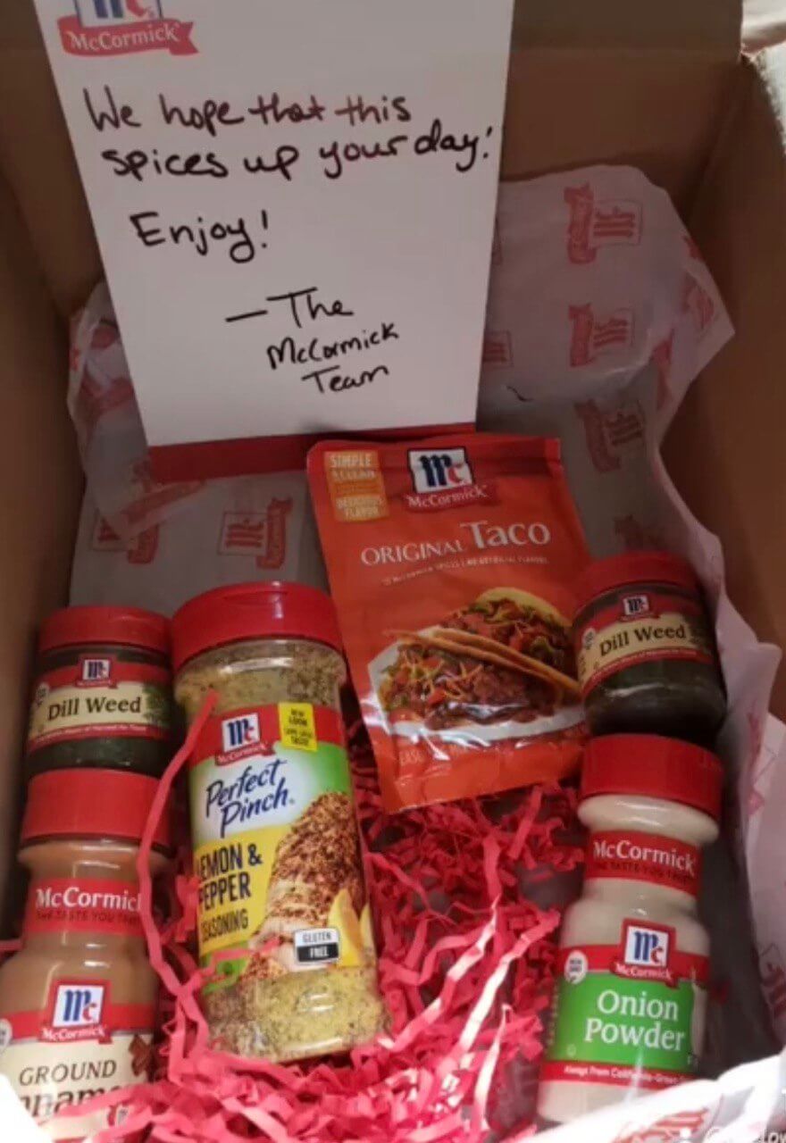 McCormick Christmas spice gift set on kitchen counter with holiday decorations